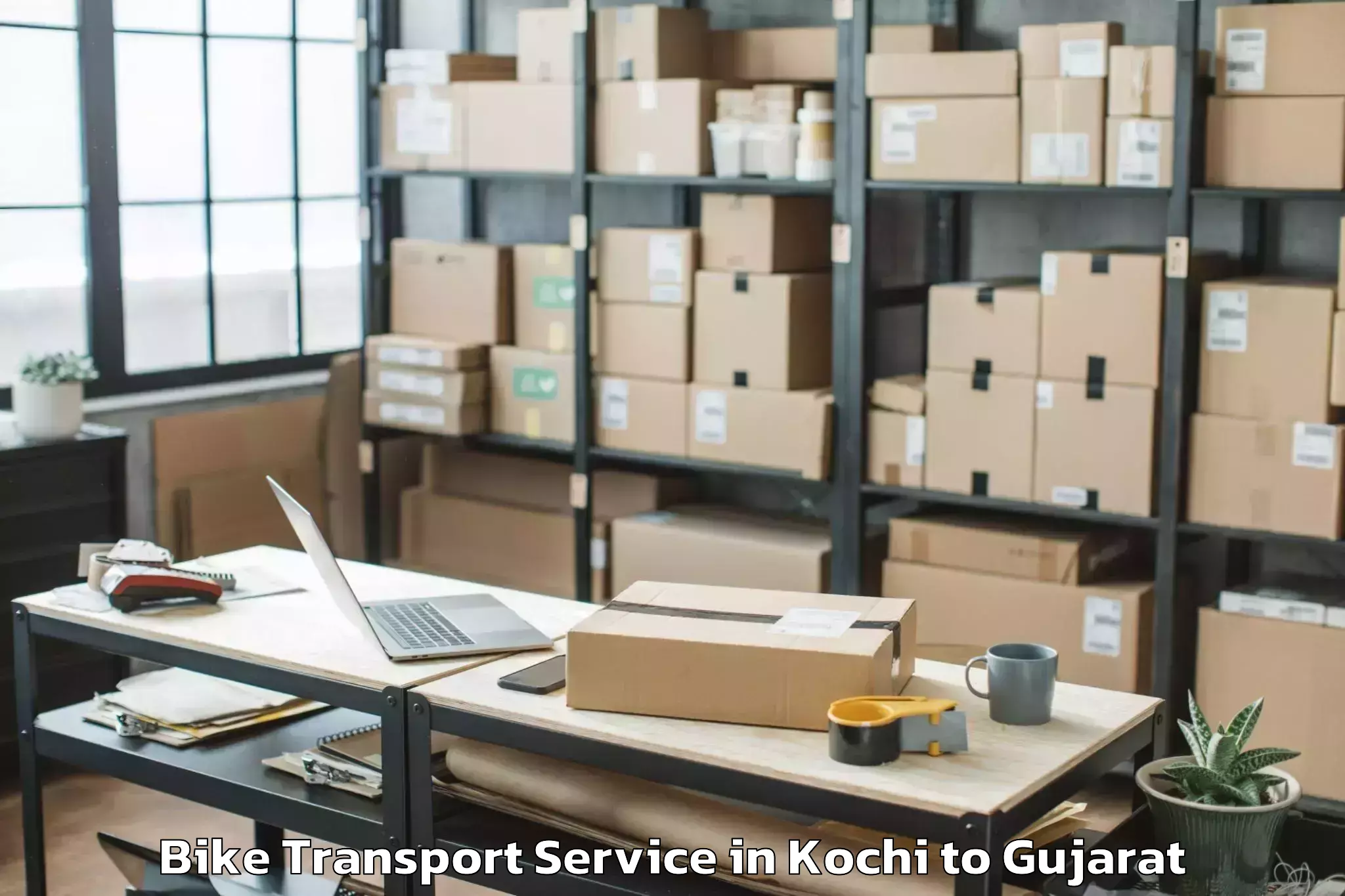 Hassle-Free Kochi to Gujarat National Law Universit Bike Transport